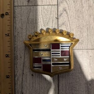 Cadillac Gold and Multicolor Emblem
